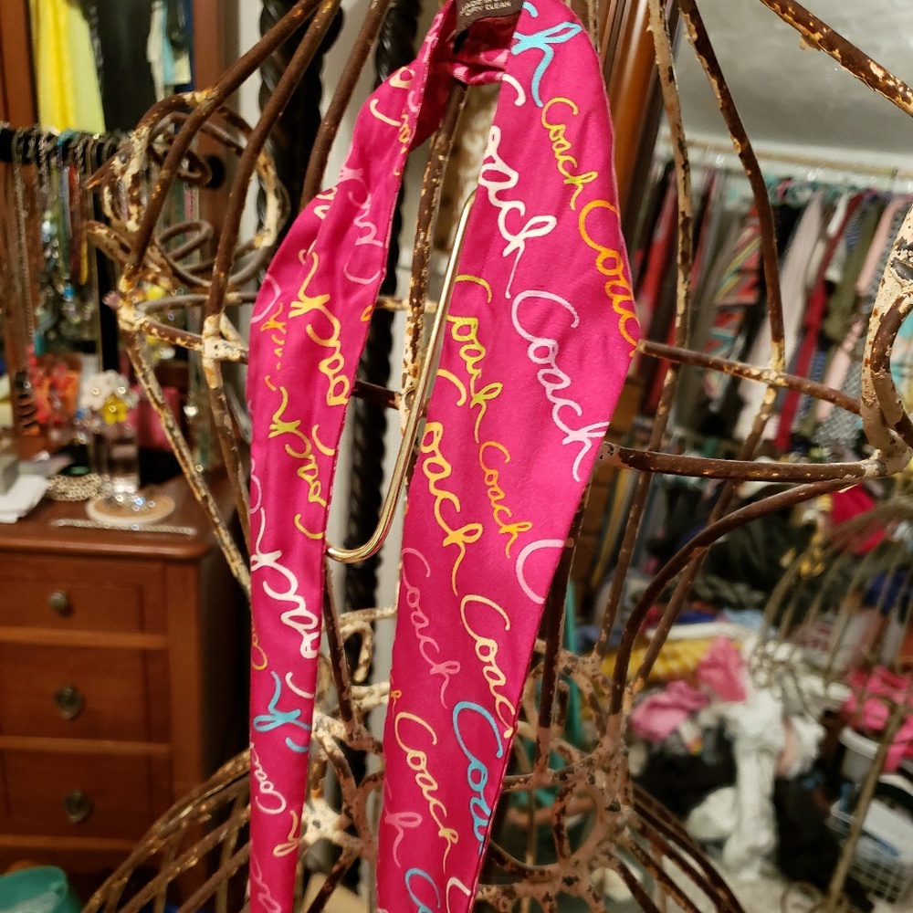 Coach tie multi color. Good condition.